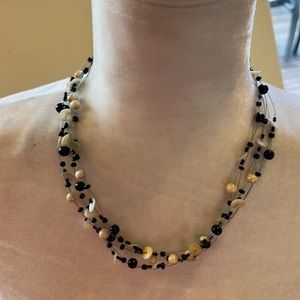 Black/cream beaded necklace. Worn several times.  Listing #7260